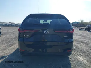 2025 Mazda CX-90 Premium Sport z VIN JM3KKCHD3S1218675, wystawiony jako IAAI lot #41971539 z przebiegiem Nie podano mil oraz . Historia ofert i sprzedaży dostępna na DreamBid. Obrazek 17.