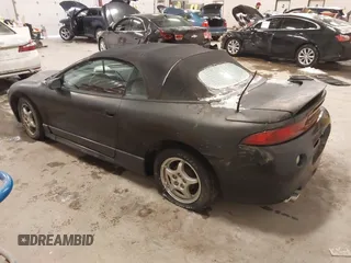 1999 Mitsubishi Eclipse GS with VIN 4A3AX35G3XE061702, listed as a IAAI auction lot 41323151 with 155,941 mi miles. Bid and sale history available at carsss.com. Image 3.