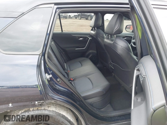2021 Toyota RAV4 Hybrid XSE with VIN 4T3E6RFV0MU053245, listed as a IAAI auction lot 42426959 with 28,717 mi miles and . Bid and sale history available at DreamBid. Image 8.