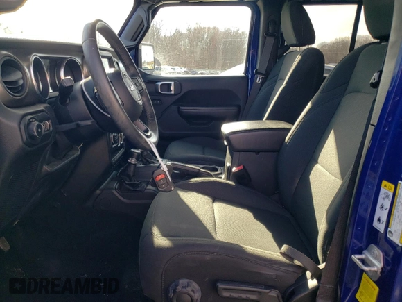 2019 Jeep Wrangler Unlimited Sport S with VIN 1C4HJXDG6KW582301, listed as a Copart auction lot 43180525 with 64,477 mi miles and Salvage title. Bid and sale history available at DreamBid. Image 7.