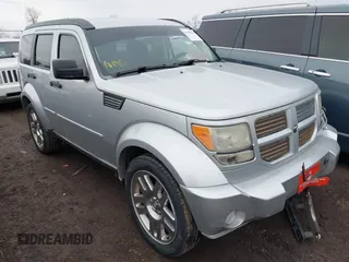 2010 Dodge Nitro Heat z VIN 1D4PU4GK2AW157306, wystawiony jako IAAI lot #41702030 z przebiegiem 223 023 mil mil oraz . Historia ofert i sprzedaży dostępna na DreamBid. Obrazek 1.