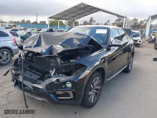 2016 BMW X6 xDrive35i with VIN 5UXKU2C50G0N83968, listed as a IAAI auction lot 41958971 with 70,738 mi miles. Bid and sale history available at carsss.com. Image 2.
