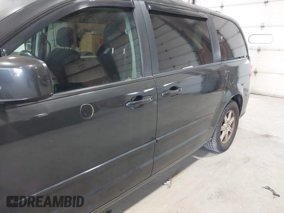 2012 Dodge Grand Caravan SXT with VIN 2C4RDGCG4CR224850, listed as a IAAI auction lot 42070300 with 177,982 mi miles and . Bid and sale history available at DreamBid. Image 14.