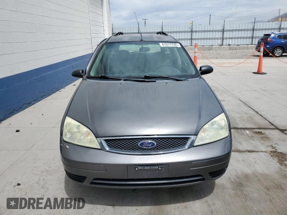 2006 Ford Focus SE with VIN 1FAHP36N56W223049, listed as a Copart auction lot 61211745 with 185,609 mi miles and Salvage title. Bid and sale history available at DreamBid. Image 5.