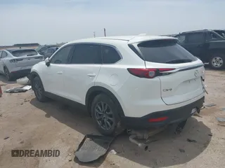 2021 Mazda CX-9 Touring with VIN JM3TCACY9M0526376, listed as a IAAI auction lot 42264478 with 74,671 mi miles and . Bid and sale history available at DreamBid. Image 3.