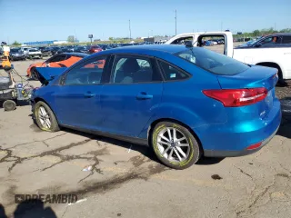 2017 Ford Focus SE with VIN 1FADP3F23HL203794, listed as a Copart auction lot 57202435 with 116,824 mi miles and Salvage title. Bid and sale history available at DreamBid. Image 2.