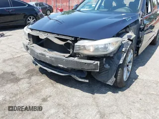 2014 BMW 3 Series 328i Gran Turismo xDrive z VIN WBA3X5C50ED557470, wystawiony jako IAAI lot #42606682 z przebiegiem 172 016 mil mil oraz . Historia ofert i sprzedaży dostępna na DreamBid. Obrazek 6.