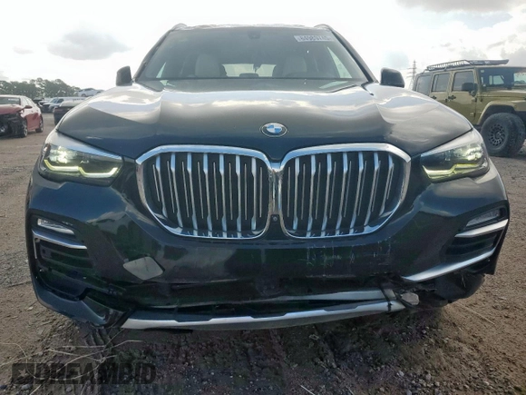 2019 BMW X5 xDrive40i with VIN 5UXCR6C54KLL35873, listed as a Copart auction lot 64989745 with 129,538 mi miles and Salvage title. Bid and sale history available at DreamBid. Image 5.