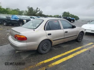 1999 Chevrolet Prizm z VIN 1Y1SK5284XZ403676, wystawiony jako Copart lot #57961725 z przebiegiem Nie podano mil oraz Szkody całkowita. Historia ofert i sprzedaży dostępna na DreamBid. Obrazek 3.