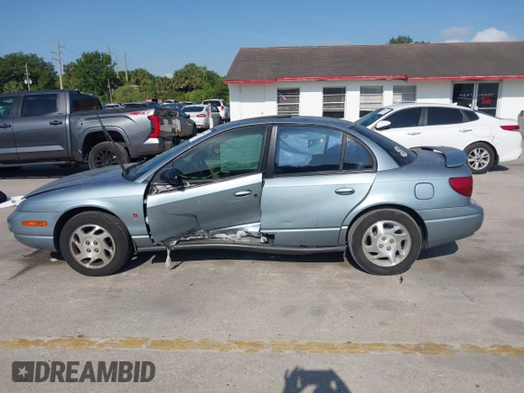 2002 Saturn SL z VIN 1G8ZK54702Z130021, wystawiony jako IAAI lot #42091064 z przebiegiem 68 754 mil mil oraz . Historia ofert i sprzedaży dostępna na DreamBid. Obrazek 14.