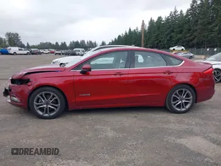 2017 Ford Fusion Hybrid SE с VIN 3FA6P0LU6HR324771, выставлен на аукционе IAAI как лот 42612195 с пробегом 103 988 миль миль и . История ставок и продаж доступна на DreamBid. Изображение 14.