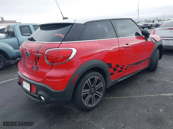2014 MINI Cooper Paceman S with VIN WMWSS5C58EWN66898, listed as a IAAI auction lot 41513529 with 86406 miles. Bid and sale history available at carsss.com. Image 4.