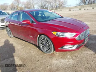 2017 Ford Fusion Hybrid Titanium с VIN 3FA6P0RU7HR157294, выставлен на аукционе IAAI как лот 41909609 с пробегом 162 046 миль миль и . История ставок и продаж доступна на DreamBid. Изображение 1.
