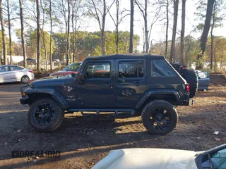 2018 Jeep Wrangler JK Unlimited Altitude with VIN 1C4BJWEG1JL842456, listed as a IAAI auction lot 41123988 with 55,310 mi miles. Bid and sale history available at carsss.com. Image 14.