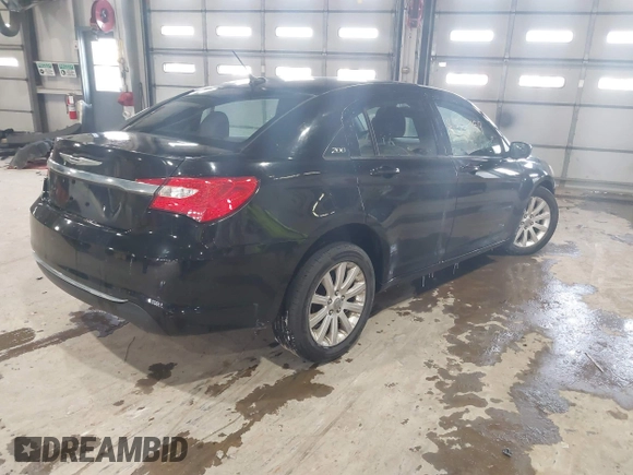 2013 Chrysler 200 Touring with VIN 1C3CCBBB6DN501373, listed as a IAAI auction lot 41587159 with 193,410 mi miles and . Bid and sale history available at DreamBid. Image 4.