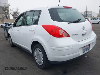 2010 Nissan Versa 1.8 SL with VIN 3N1BC1CP2AL457222, listed as a IAAI auction lot 42128211 with 194,450 mi miles. Bid and sale history available at carsss.com. Image 3.