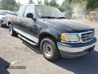 2003 Ford F-150 XL with VIN 2FTRX17293CA94389, listed as a Copart auction lot 65462825 with 165,638 mi miles and Clean title. Bid and sale history available at DreamBid. Image 4.