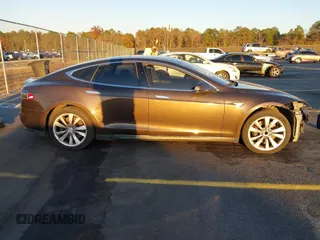 2013 Tesla Model S with VIN 5YJSA1CN7DFP22690, listed as a IAAI auction lot 40981089 with 188,057 mi miles. Bid and sale history available at carsss.com. Image 14.
