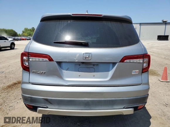 2020 Honda Pilot EX-L с VIN 5FNYF5H59LB010398, выставлен на аукционе Copart как лот 51812005 с пробегом 81 000 миль миль и Списание • Salvage title. История ставок и продаж доступна на DreamBid. Изображение 6.