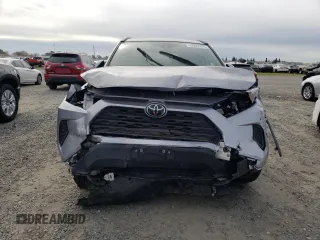 2021 Toyota RAV4 LE with VIN JTMK1RFVXMD075722, listed as a Copart auction lot 47822075 with 20,977 mi miles and Salvage Title. Bid and sale history available at carsss.com. Image 5.