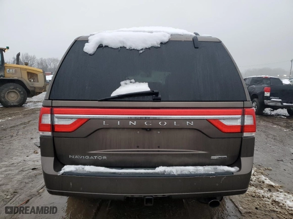 2015 Lincoln Navigator with VIN 5LMJJ2JT7FEJ14653, listed as a Copart auction lot 44921315 with 112,183 mi miles and Salvage Title. Bid and sale history available at carsss.com. Image 6.