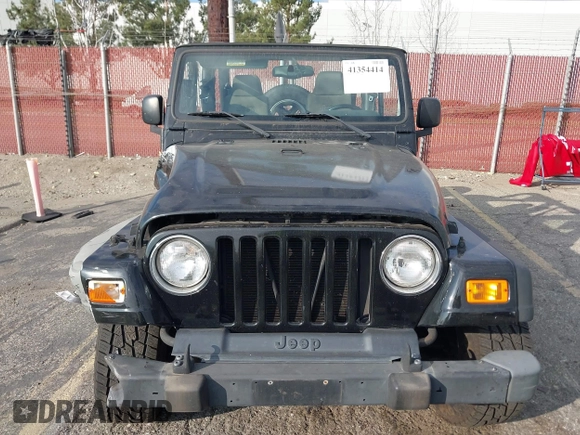 2003 Jeep Wrangler Sport with VIN 1J4FA49S23P328867, listed as a IAAI auction lot 41354414 with 96,703 mi miles. Bid and sale history available at carsss.com. Image 12.