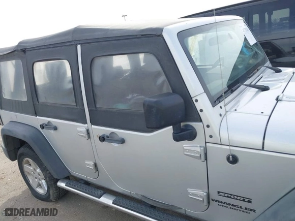 2010 Jeep Wrangler Unlimited Sport with VIN 1J4BA3H10AL112599, listed as a IAAI auction lot 41739263 with 156,301 mi miles. Bid and sale history available at carsss.com. Image 13.