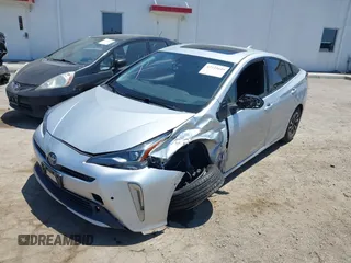2022 Toyota Prius L Eco with VIN JTDKAMFU5N3188107, listed as a IAAI auction lot 42223649 with 180,894 mi miles and . Bid and sale history available at DreamBid. Image 6.