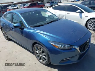 2018 Mazda 3 Touring with VIN 3MZBN1V38JM206827, listed as a IAAI auction lot 41983631 with 51,303 mi miles and . Bid and sale history available at DreamBid. Image 1.