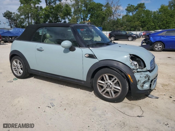 2014 MINI Cooper Convertible with VIN WMWZN3C53ET861483, listed as a Copart auction lot 52788785 with 20,274 mi miles and Salvage Title. Bid and sale history available at carsss.com. Image 4.