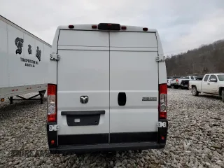2023 Ram ProMaster Cargo with VIN 3C6MRVJG8PE506829, listed as a Copart auction lot 55868065 with 52,342 mi miles and Clean Title. Bid and sale history available at DreamBid. Image 6.
