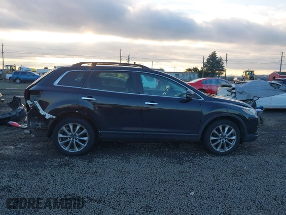 2014 Mazda CX-9 Grand Touring with VIN JM3TB3DV7E0429276, listed as a IAAI auction lot 41415446 with 94,939 mi miles and . Bid and sale history available at DreamBid. Image 14.