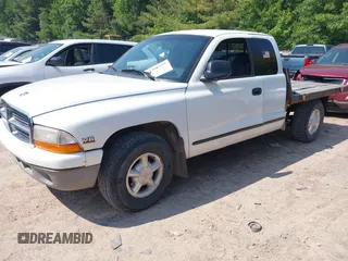 1998 Dodge Dakota SLT z VIN 1B7GL22X9WS620905, wystawiony jako IAAI lot #42388299 z przebiegiem 146 315 mil mil oraz . Historia ofert i sprzedaży dostępna na DreamBid. Obrazek 2.