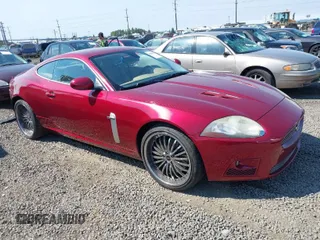 2007 Jaguar XK with VIN SAJWA43C179B19206, listed as a IAAI auction lot 39861830 with 124,204 mi miles. Bid and sale history available at carsss.com. Image 1.