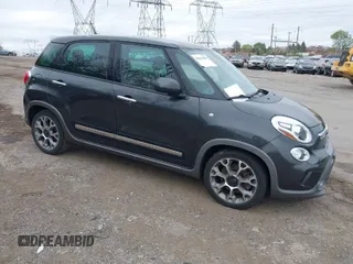 2014 FIAT 500L Trekking with VIN ZFBCFADHXEZ011031, listed as a IAAI auction lot 42094509 with 74,132 mi miles. Bid and sale history available at carsss.com. Image 1.