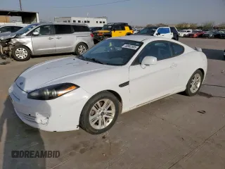 2007 Hyundai Tiburon GS z VIN KMHHM66D27U260421, wystawiony jako Copart lot #48982505 z przebiegiem 100 045 mil mil oraz Tytuł czysty. Historia ofert i sprzedaży dostępna na DreamBid. Obrazek 1.