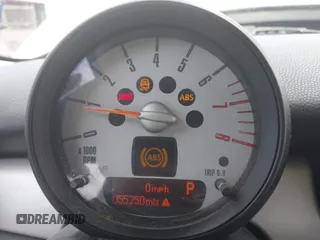2012 MINI Hardtop with VIN WMWSU3C54CT262450, listed as a IAAI auction lot 42148430 with 55,250 mi miles and . Bid and sale history available at DreamBid. Image 7.