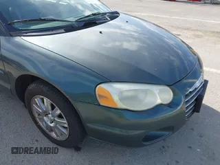 2004 Chrysler Sebring Limited with VIN 1C3EL65R44N228569, listed as a IAAI auction lot 41841279 with 182,964 mi miles and . Bid and sale history available at DreamBid. Image 6.