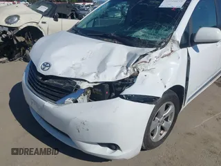 2014 Toyota Sienna LE AAS with VIN 5TDKK3DC4ES515791, listed as a IAAI auction lot 42304201 with 113,139 mi miles and . Bid and sale history available at DreamBid. Image 6.