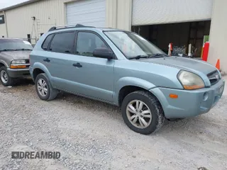 2009 Hyundai Tucson GLS with VIN KM8JM12B19U005254, listed as a IAAI auction lot 42060256 with 184,676 mi miles. Bid and sale history available at carsss.com. Image 1.