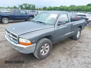 2003 Dodge Dakota with VIN 1D7FL46X43S190137, listed as a IAAI auction lot 42525471 with 130,773 mi miles and . Bid and sale history available at DreamBid. Image 2.