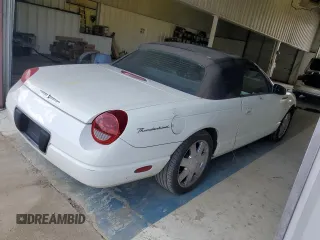 2002 Ford Thunderbird Hardtop Premium z VIN 1FAHP60A52Y130277, wystawiony jako Copart lot #69473594 z przebiegiem Nie podano mil oraz Szkoda całkowita • Salvage title. Historia ofert i sprzedaży dostępna na DreamBid. Obrazek 3.