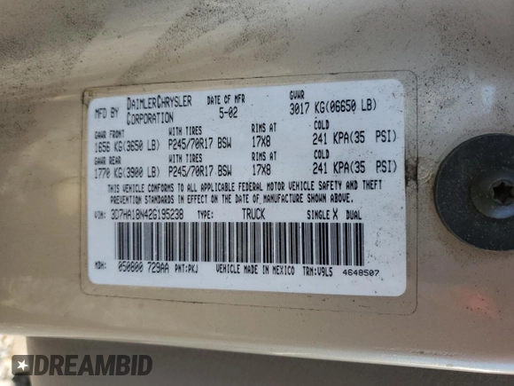 2002 Dodge 1500 z VIN 3D7HA18N42G195238, wystawiony jako Copart lot #57094715 z przebiegiem 185 931 mil mil oraz Szkoda całkowita • Salvage title. Historia ofert i sprzedaży dostępna na DreamBid. Obrazek 13.