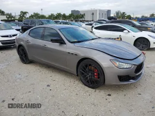2019 Maserati Ghibli z VIN ZAM57XSA2K1328545, wystawiony jako Copart lot #56291895 z przebiegiem 53 625 mil mil oraz Tytuł czysty. Historia ofert i sprzedaży dostępna na DreamBid. Obrazek 4.