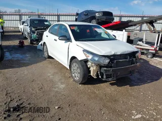 2018 Kia Rio S with VIN 3KPA24ABXJE072094, listed as a IAAI auction lot 41337072 with 115,276 mi miles. Bid and sale history available at carsss.com. Image 1.