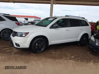 2019 Dodge Journey SE with VIN 3C4PDCBB7KT797842, listed as a IAAI auction lot 42036147 with 163,919 mi miles and . Bid and sale history available at DreamBid. Image 2.
