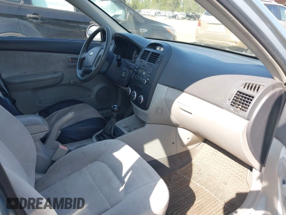 2007 Kia Spectra EX with VIN KNAFE121175389331, listed as a IAAI auction lot 42078709 with 199,324 mi miles. Bid and sale history available at carsss.com. Image 5.