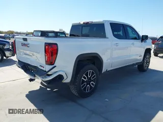 2021 GMC Sierra 1500 AT4 with VIN 1GTU9EET6MZ178665, listed as a IAAI auction lot 41765746 with 113,526 mi miles. Bid and sale history available at carsss.com. Image 4.