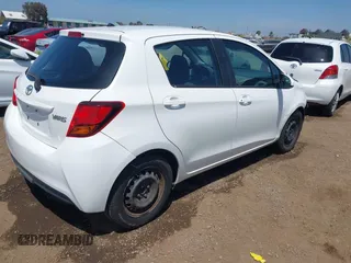 2015 Toyota Yaris L with VIN VNKKTUD37FA041957, listed as a IAAI auction lot 42106508 with 104,496 mi miles and . Bid and sale history available at DreamBid. Image 4.
