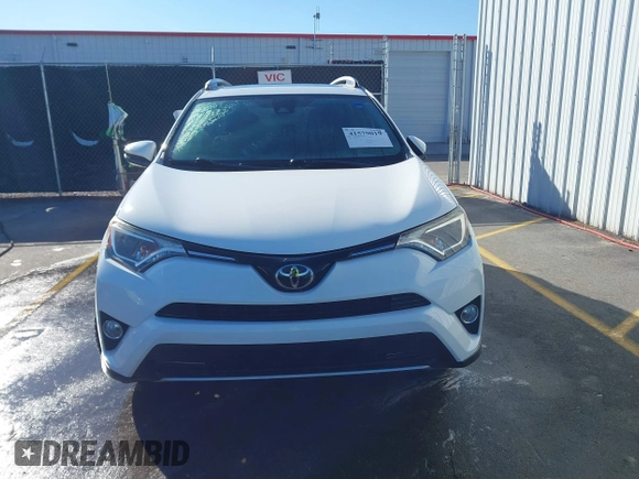 2018 Toyota RAV4 XLE with VIN JTMWFREV7JJ743297, listed as a IAAI auction lot 41579019 with 102,442 mi miles. Bid and sale history available at carsss.com. Image 12.